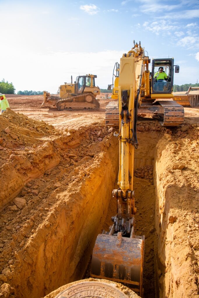 a bulldozer digging a hole