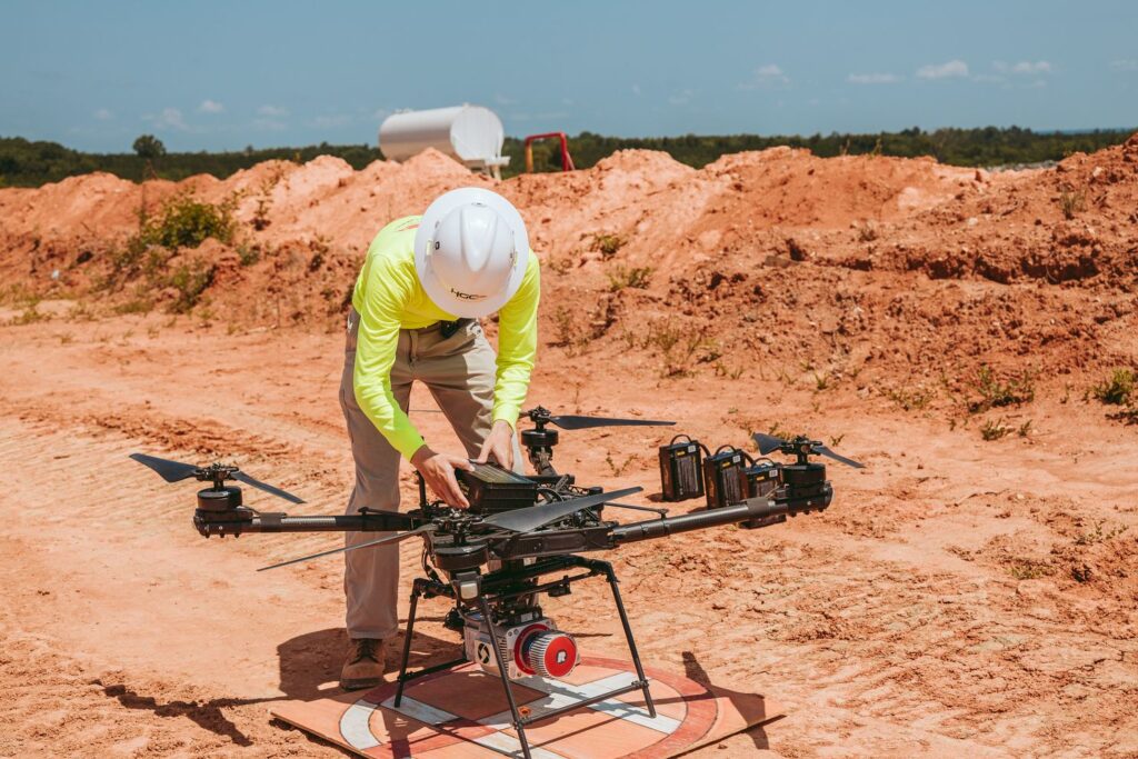 a man preparing drone equipment construction sitework faqs