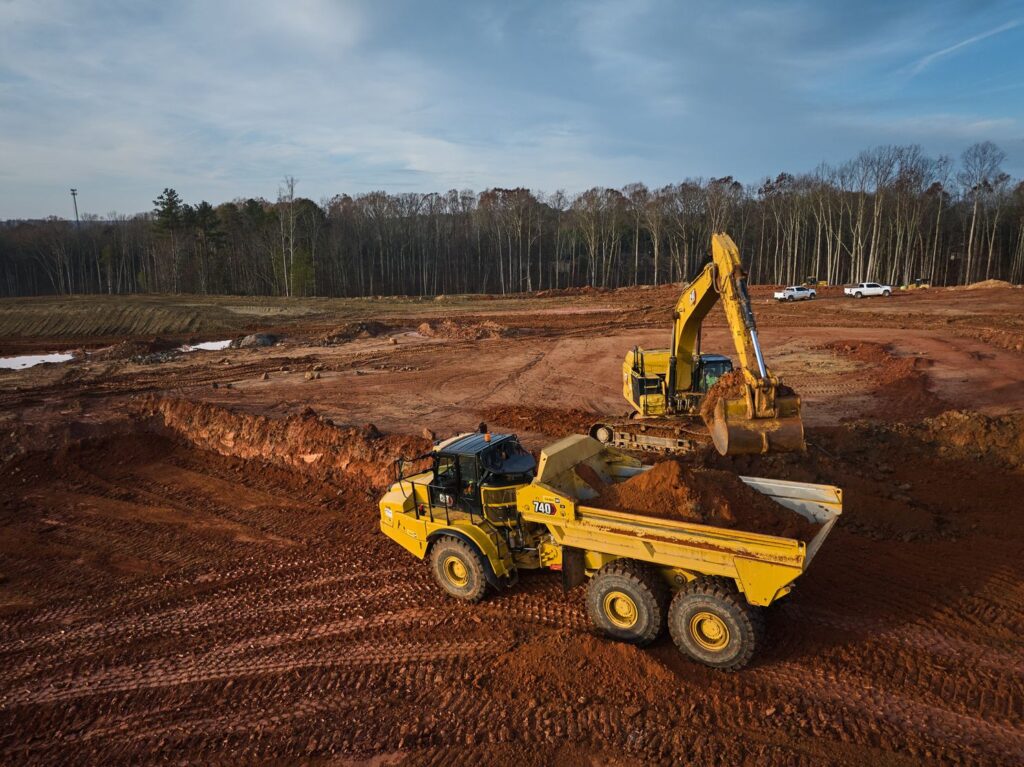 Excavator loading haul truck