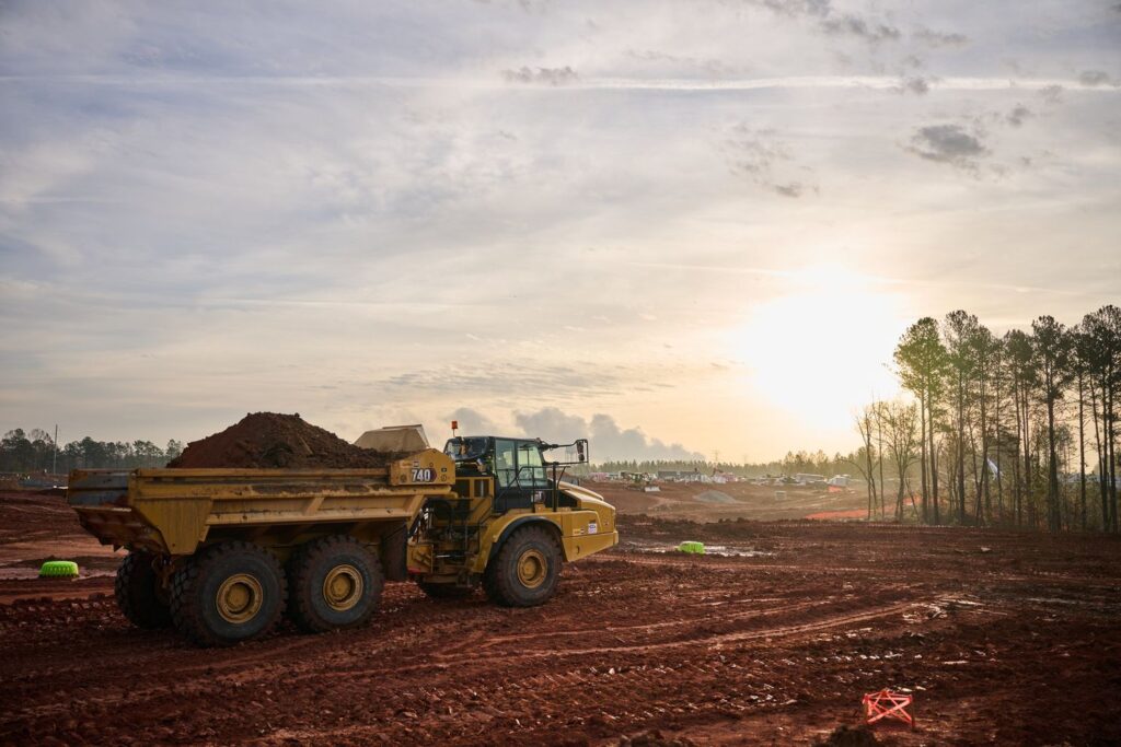 a CAT truck working on site preparation