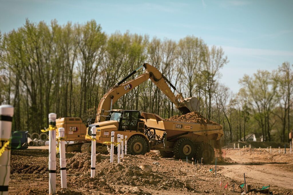 Portrait of excavator loading haul truck