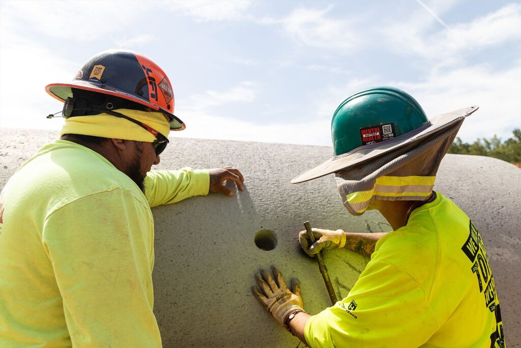 interns learning during their summer construction internship program