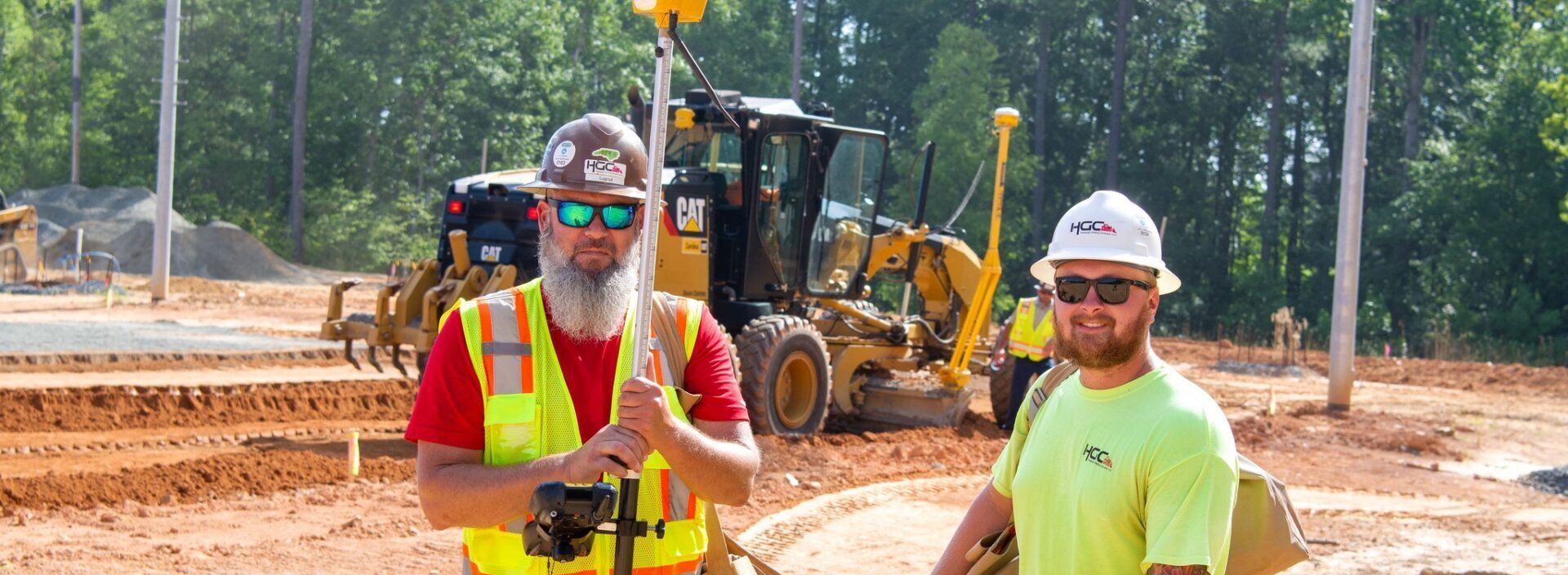 Two Surveying HGC Teammates in the Field